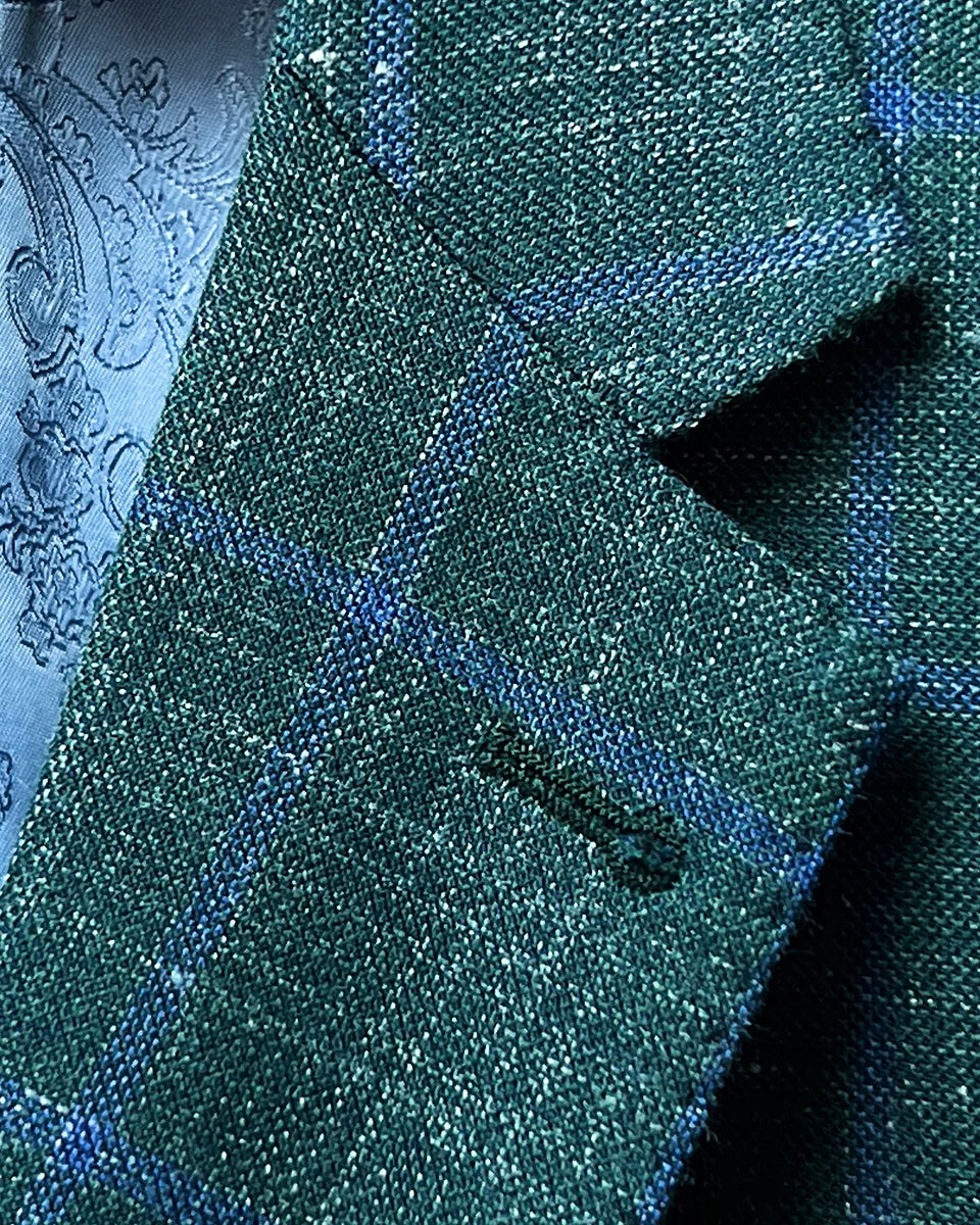 Close-up of notch lapel on dark green Westwood Hart windowpane sport coat, highlighting the classic lapel style