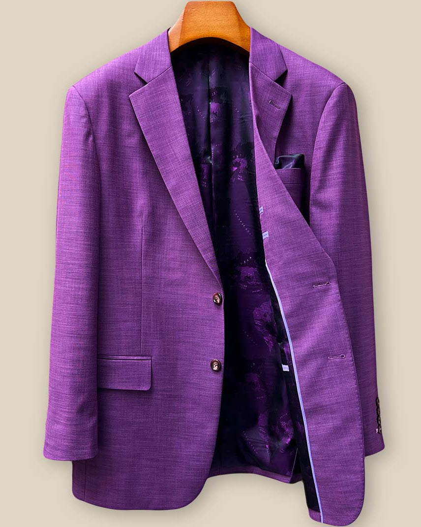 Interior left side view of custom purple sport coat revealing luxurious purple world map lining and expert tailoring construction