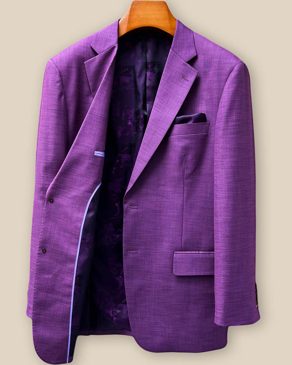 Interior right side view displaying custom tailoring details, internal pockets, and the stunning purple world map lining craftsmanship
