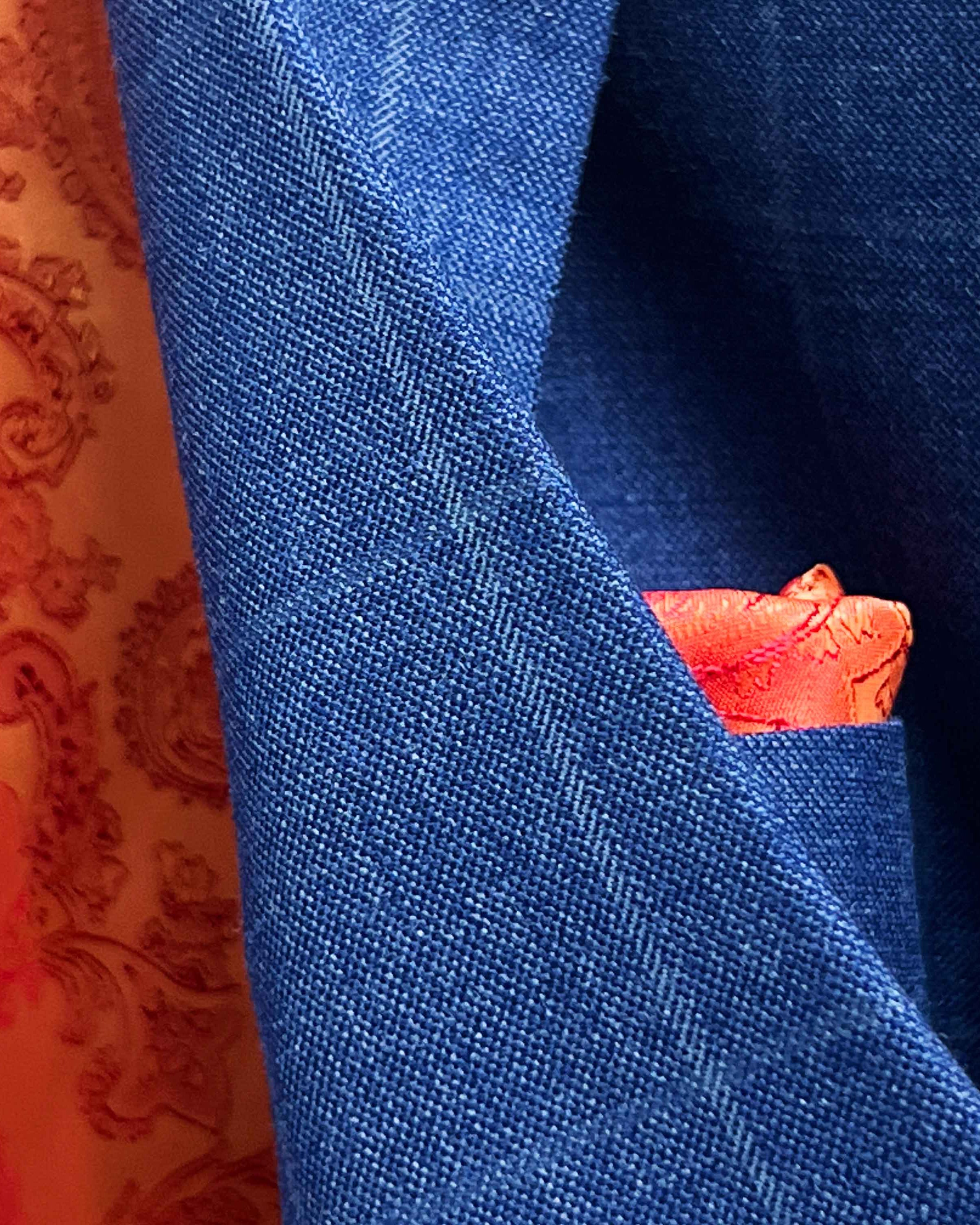 Close-up of deep blue windowpane check fabric texture showing Super 130s Australian merino wool quality and pattern detail