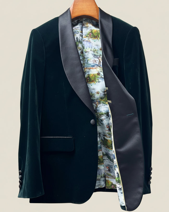 Dark green blazer with a patterned lining on a beige background