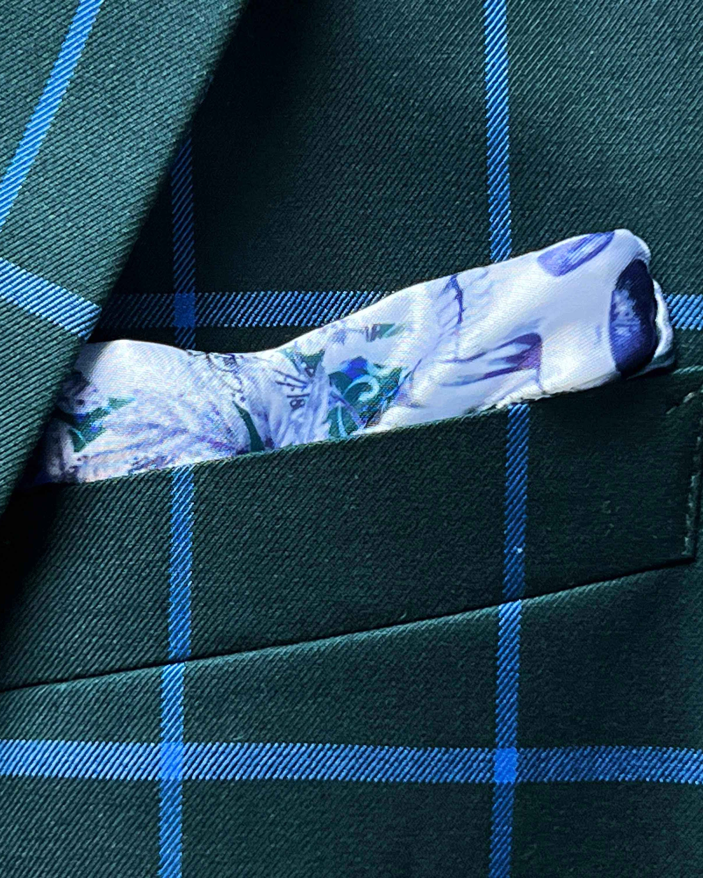 Breast pocket of forest green windowpane sport coat with built-in pocket square holder and hand-finished edges