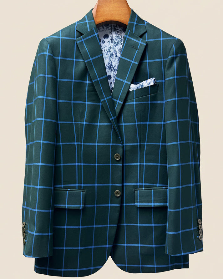 Front button panel of forest green windowpane sport coat featuring green tortoise shell buttons and hand pick stitching