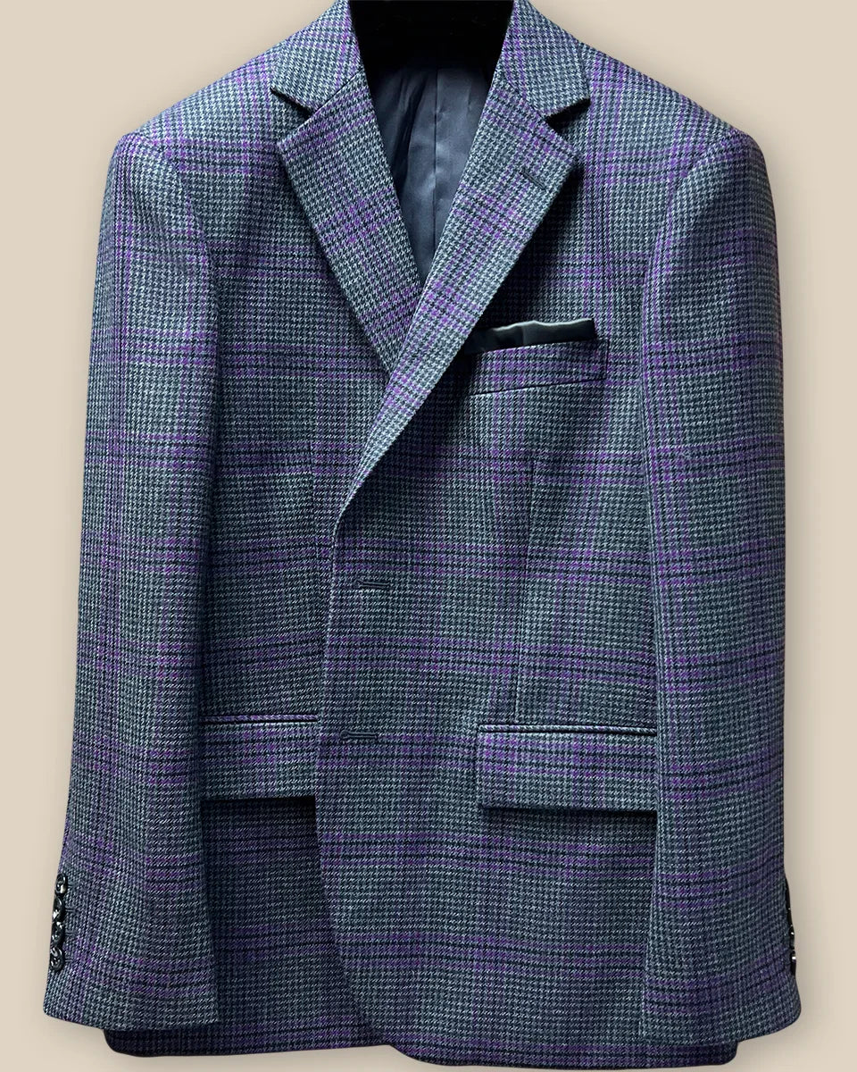 Close-up of grey and purple plaid fabric with buttonhole detail on custom Westwood Hart sport coat