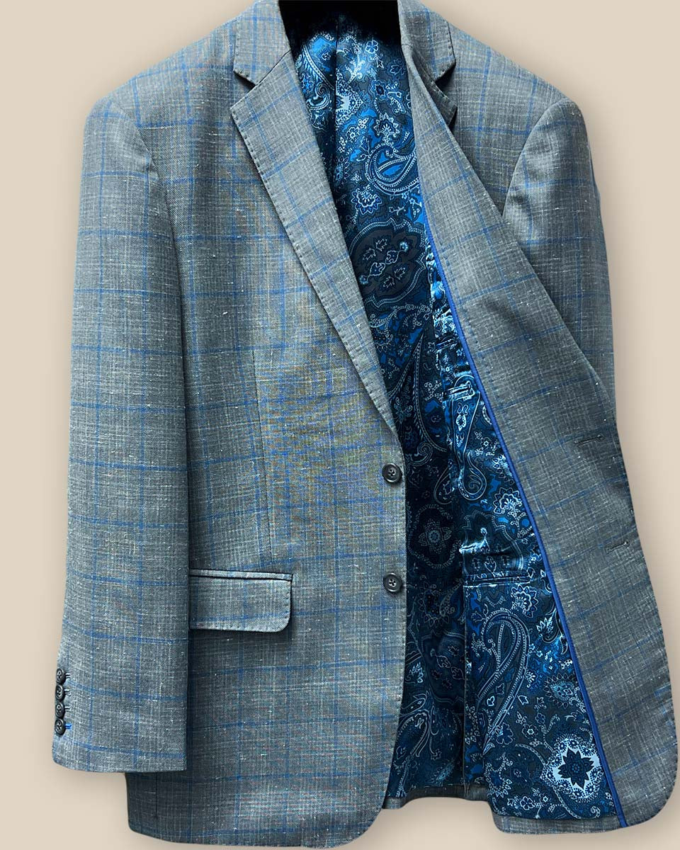 Interior view of the left side of the Westwood Hart grey with medium blue windowpane men's sport coat.