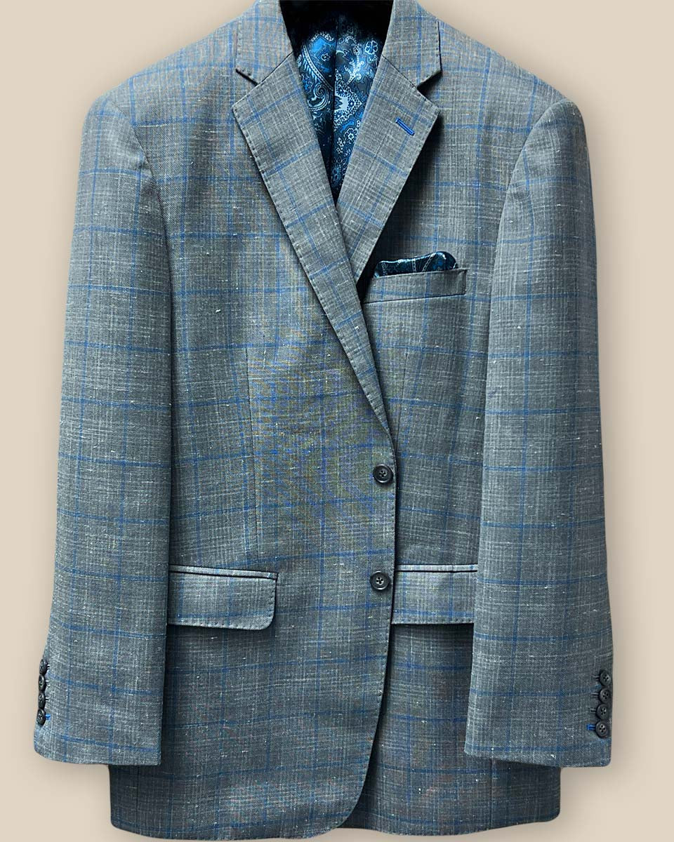 View of the button panel on the Westwood Hart grey with medium blue windowpane men's sport coat.