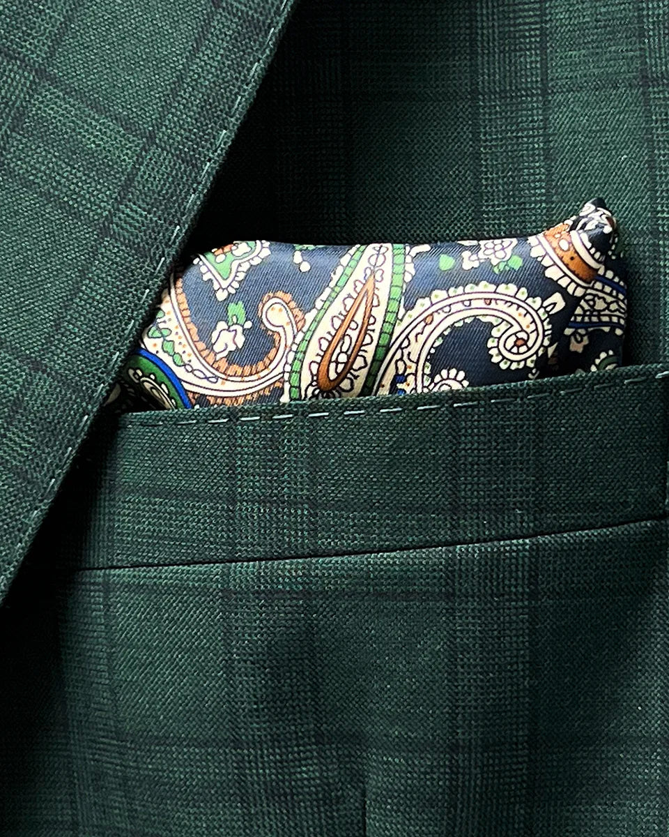 Breast pocket of hunter green checkered sport coat jacket with built-in pocket square holder and hand-finished edges