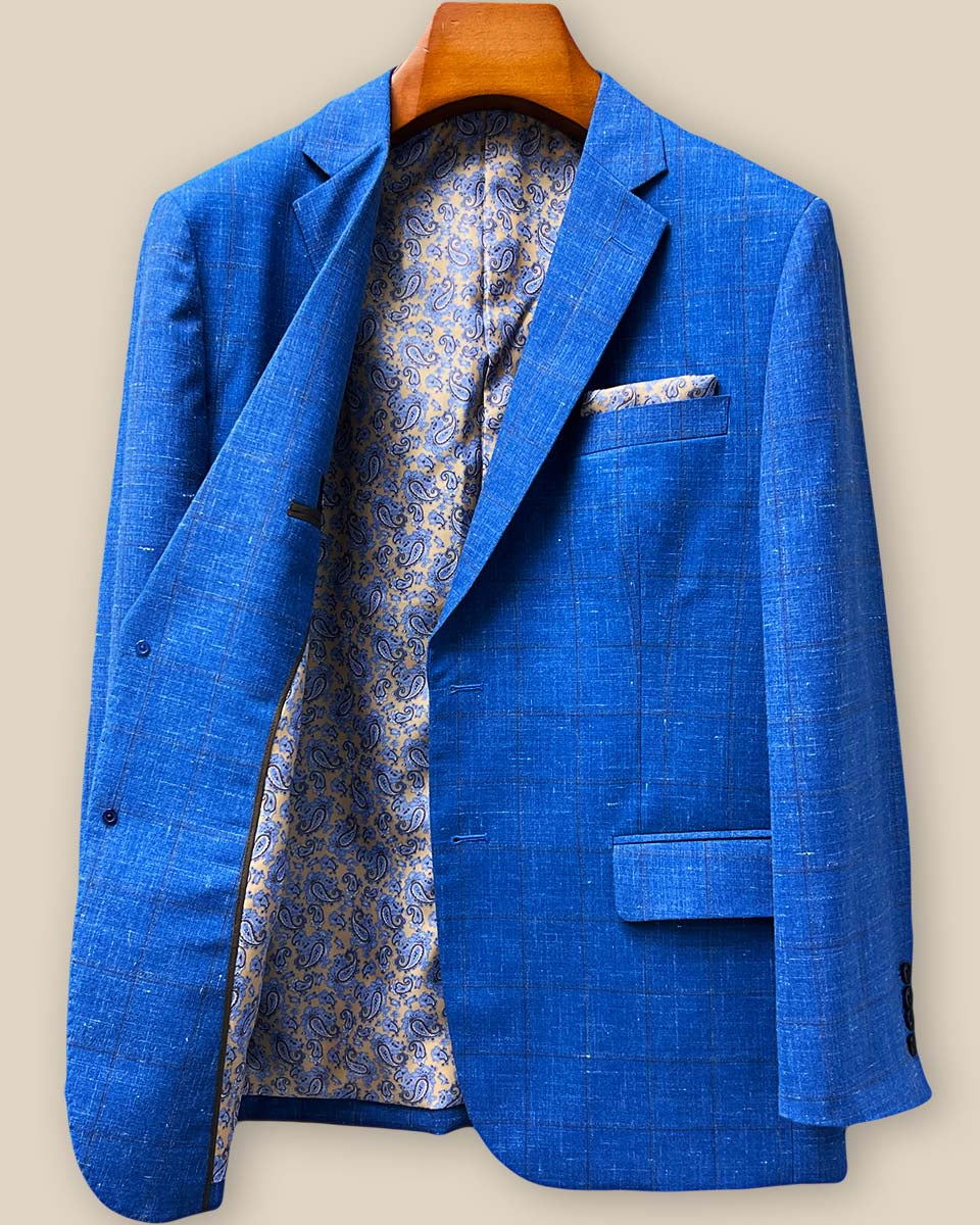 Right interior panel showcasing internal construction details, pocket placement, and brown paisley lining craftsmanship