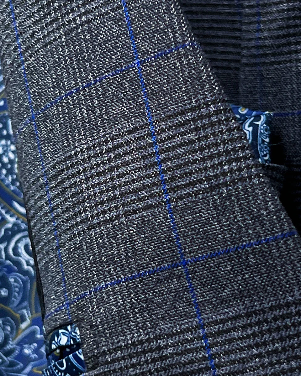 Detailed view of the lining material showcasing the premium quality of the breathable fabric used in this custom tailored suit