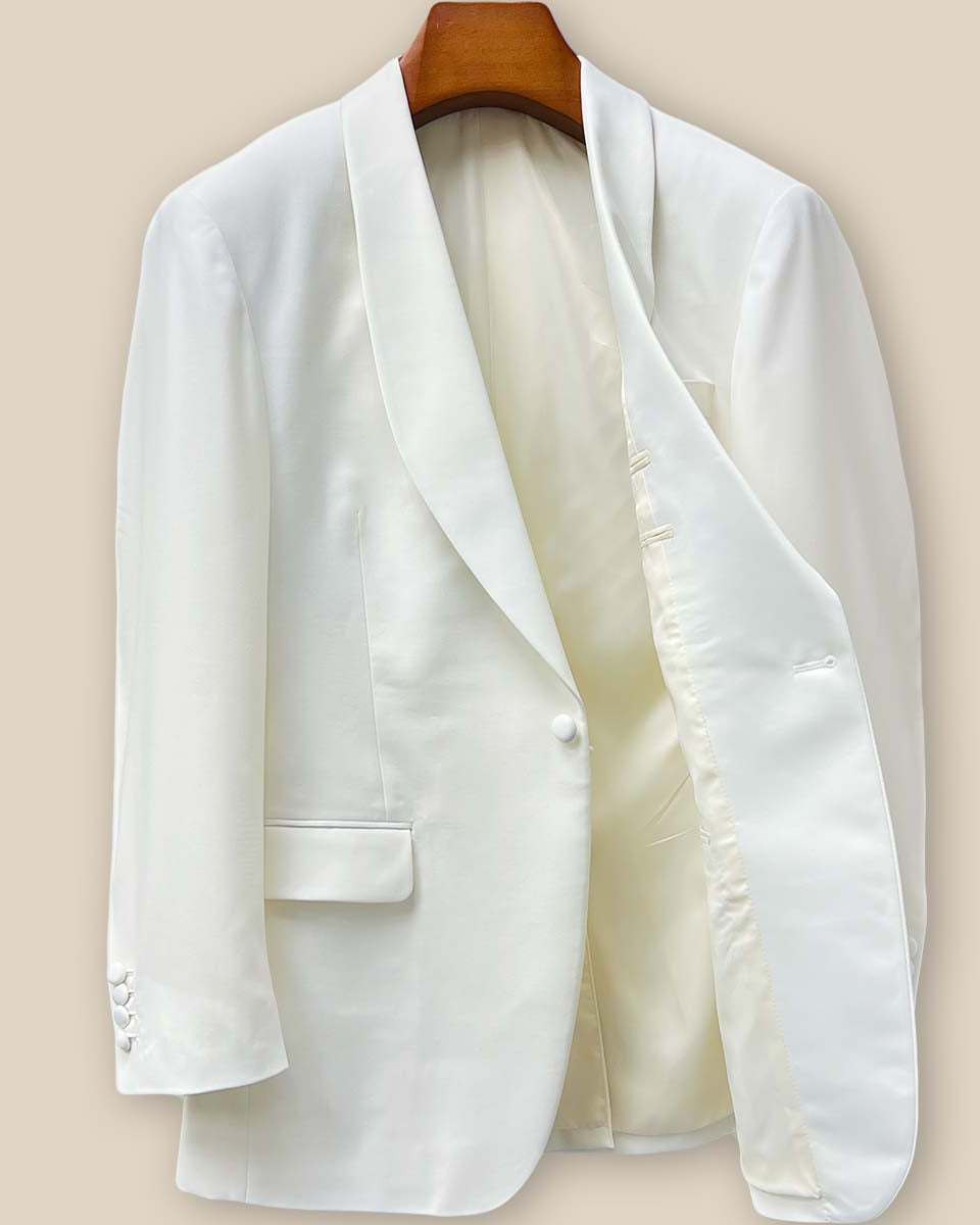 Interior left side view of the Westwood Hart off-white dinner jacket revealing pocket details and the luxurious off-white bemberg silk lining