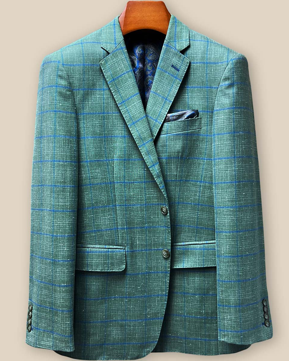 Front button stance displaying olive green horn buttons against windowpane fabric with precise spacing and professional finishing