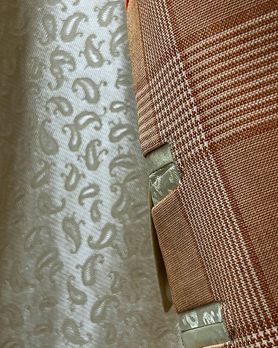 Collage of various flash lining options for the orange Prince of Wales glen plaid suit