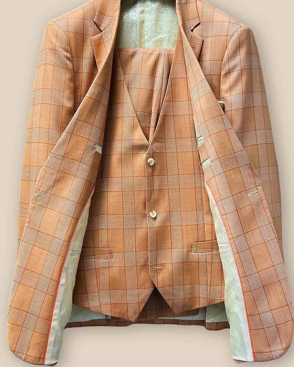 Full front view of orange Prince of Wales glen plaid three-piece suit, showcasing jacket, vest, and trousers