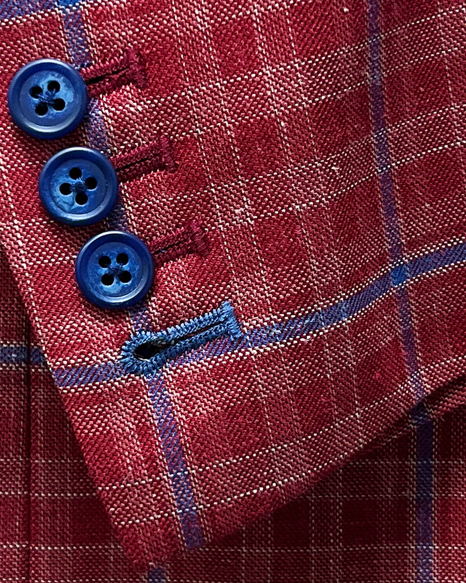Close-up of the sport coat's functional sleeve buttonholes, with an accent navy buttonhole on the last buttonhole.