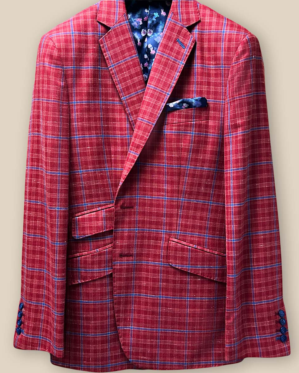 Close-up view of the sport coat's buttonhole panel, showcasing the red with navy windowpane fabric and hand-stitched pick stitching.