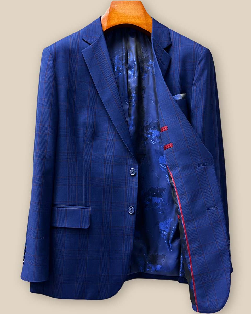 Interior left side view of custom suit jacket revealing navy world geography map flash lining with clean tailoring construction