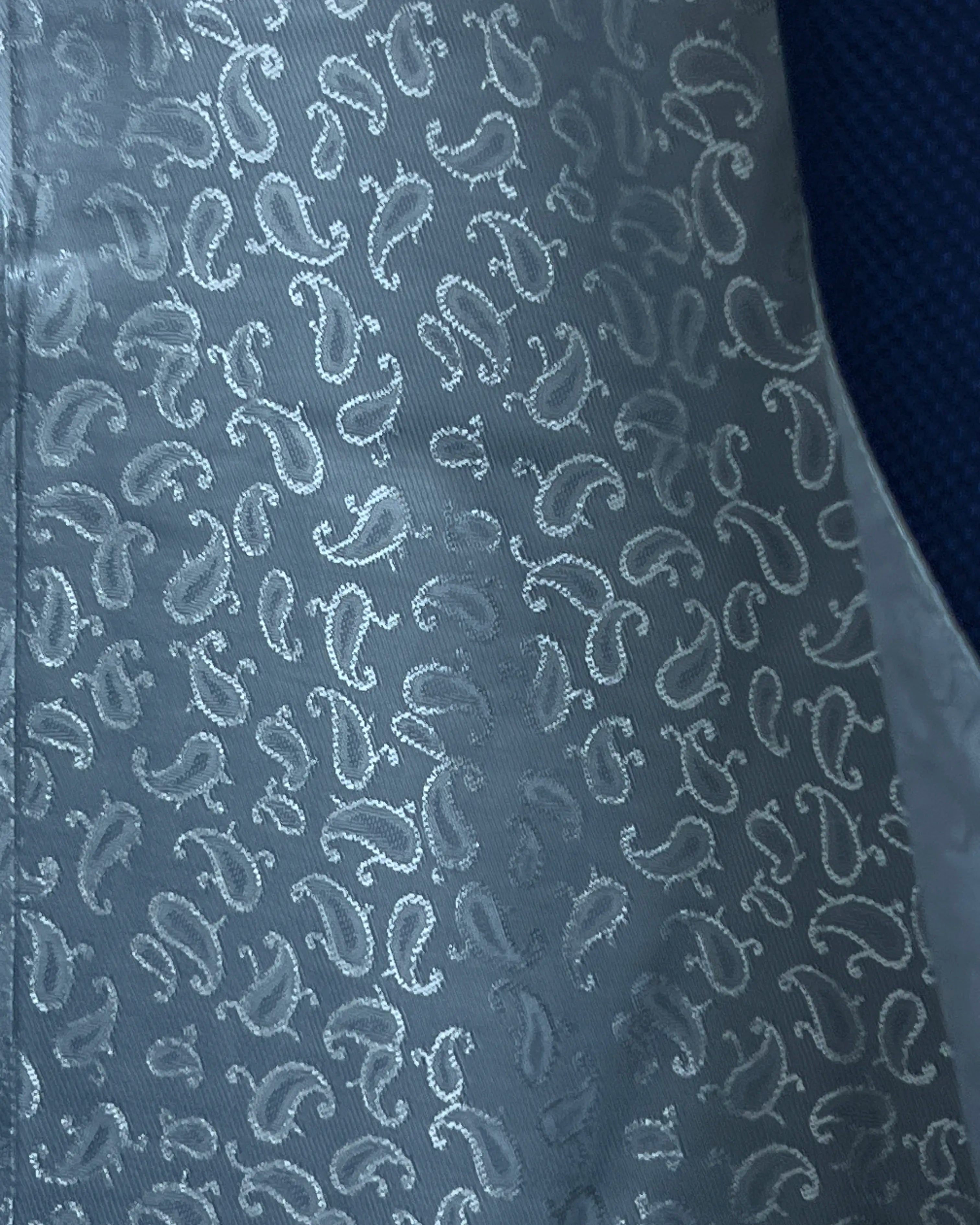 Interior lining view of Royal blue Birdseye men's sport coat showing the silver paisley style lining