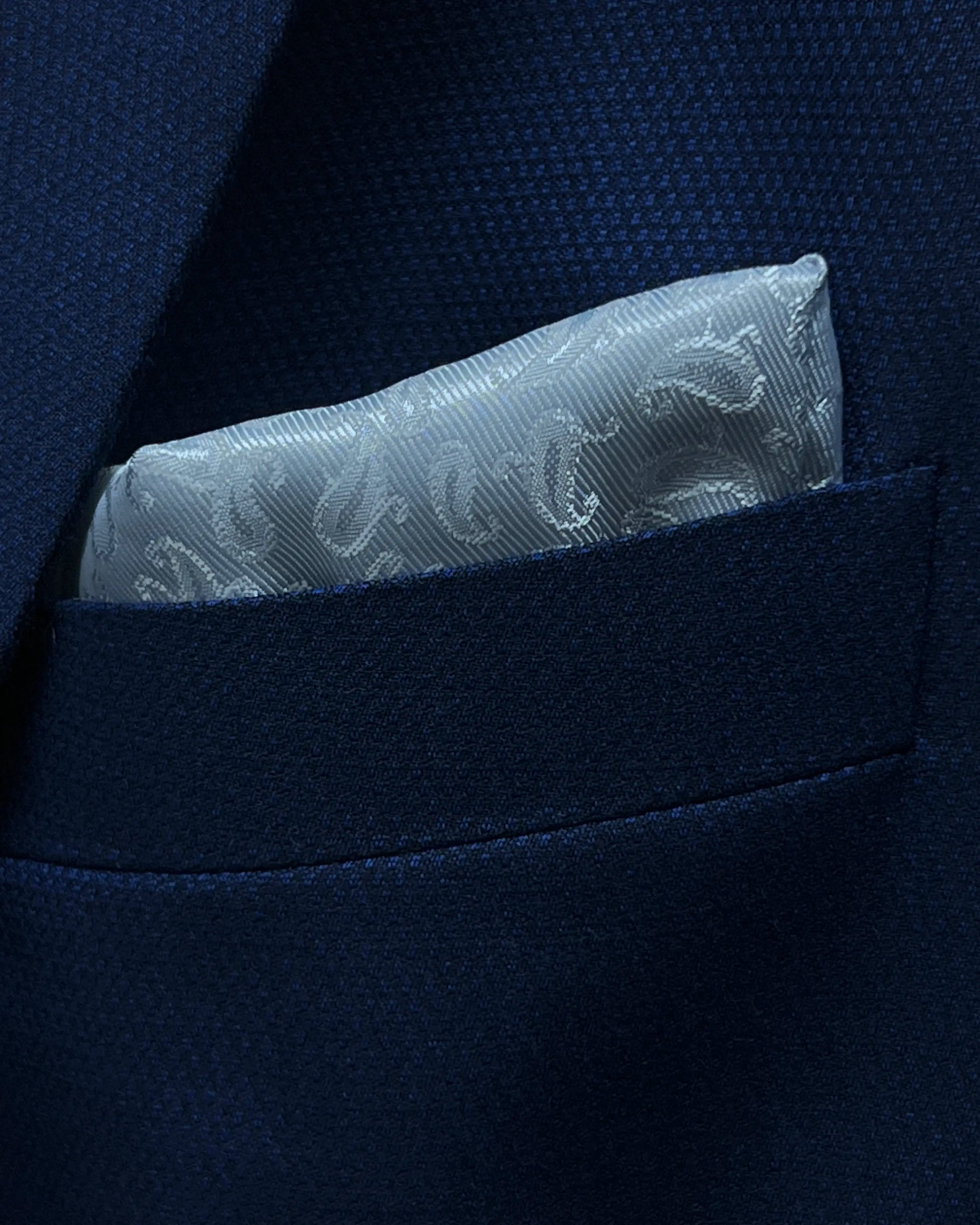 Breast pocket detail of Royal blue Birdseye men's sport coat showing the built in lining pocket square