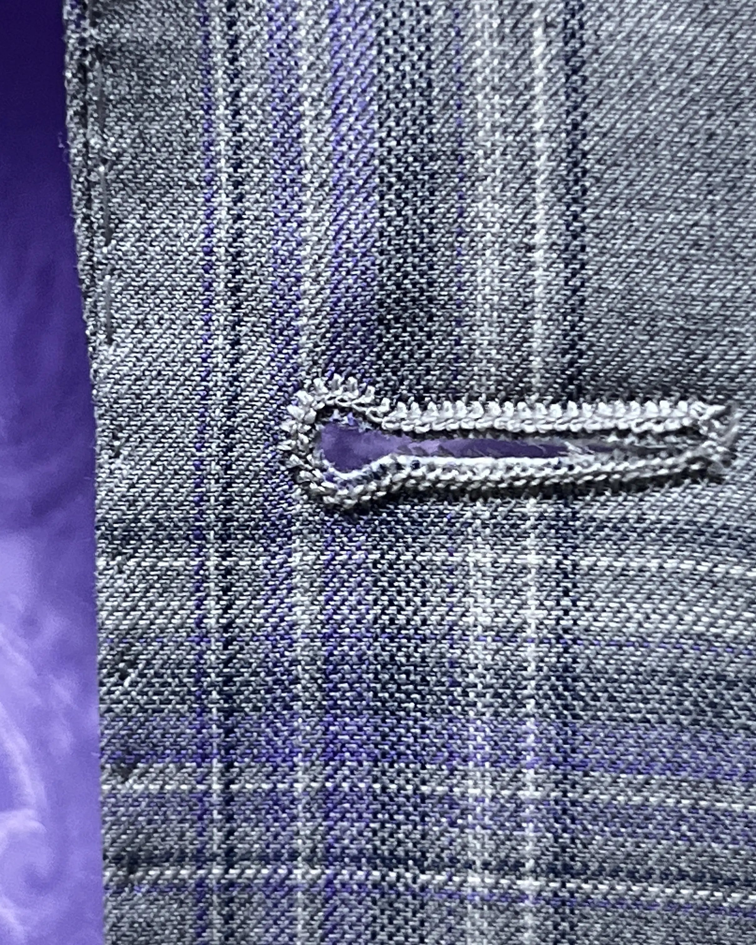 Front buttonhole close up of Steel Grey Windowpane men's sport coat showing clean tailored buttonhole construction.