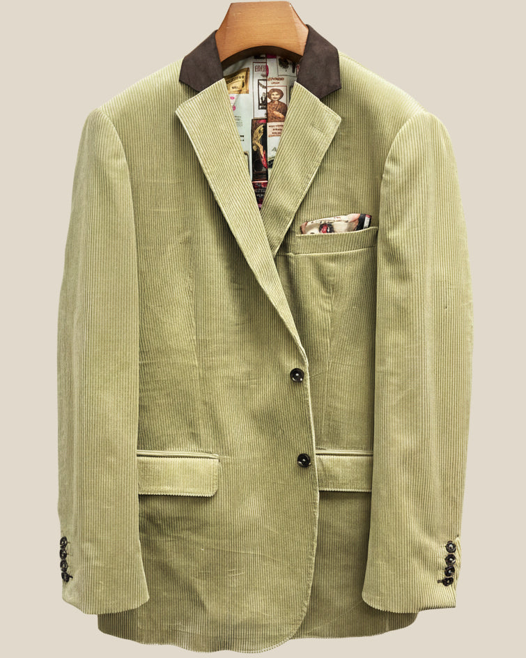 Front button panel of tan corduroy sport coat featuring chocolate brown horn buttons and hand pick stitching