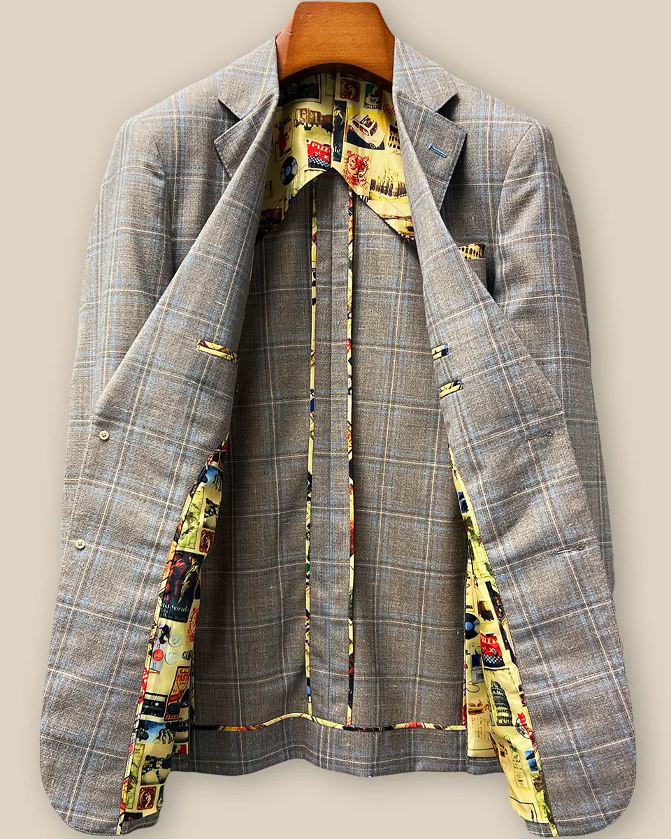 Full interior view of custom sport coat showcasing luxurious vibrant yellow multicolored mosaic lining with Westwood Hart branding