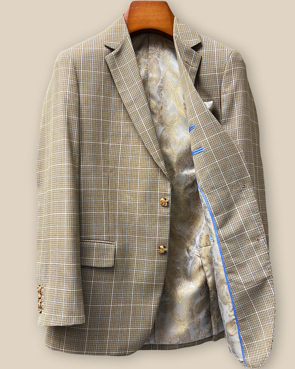 Interior left side of tan brown glen check sport coat displaying champagne gold paisley lining with inner pocket