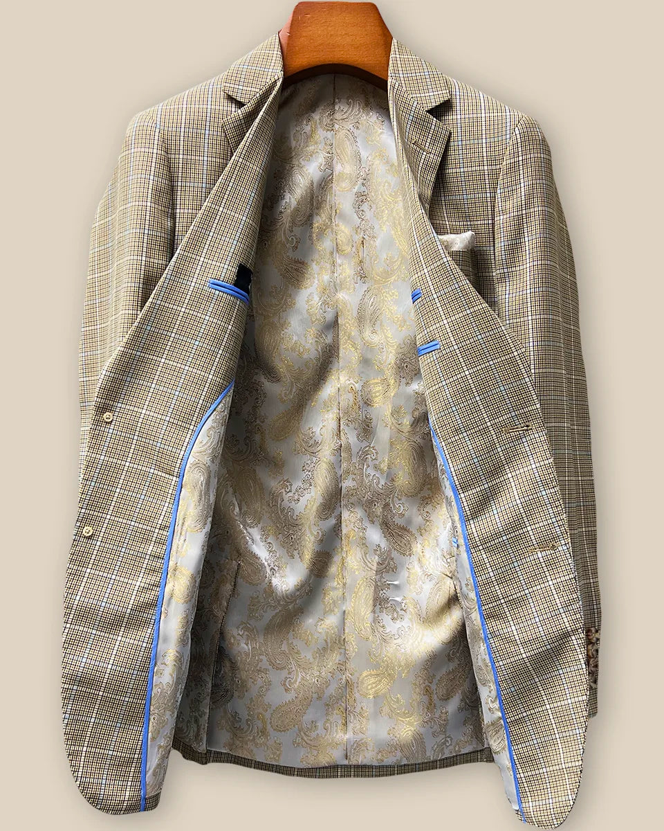 Full interior view of custom sport coat showcasing luxurious champagne gold paisley lining with Westwood Hart branding