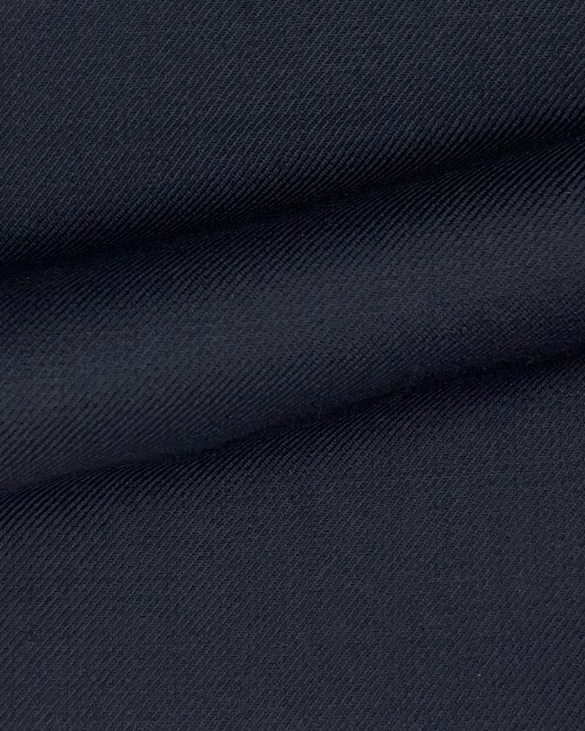 Close-up of the plain weave fabric on a navy custom suit for online design