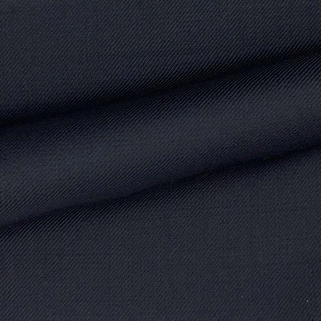 Close-up of the plain weave fabric on a navy custom suit for online design