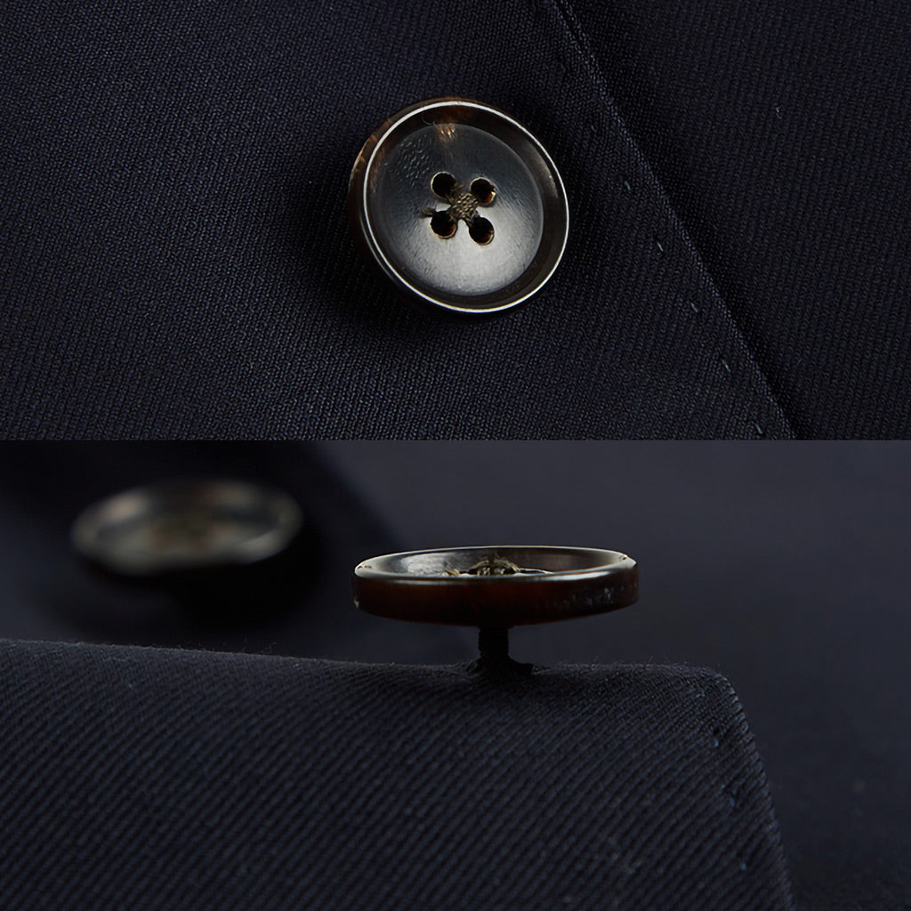 Men's custom tailored plain weave suit, side view highlighting the precise fit for work