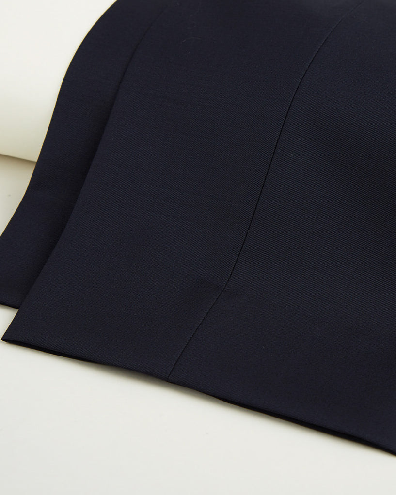 Plain weave black men's suit, rear view showcasing custom tailoring and online suit design