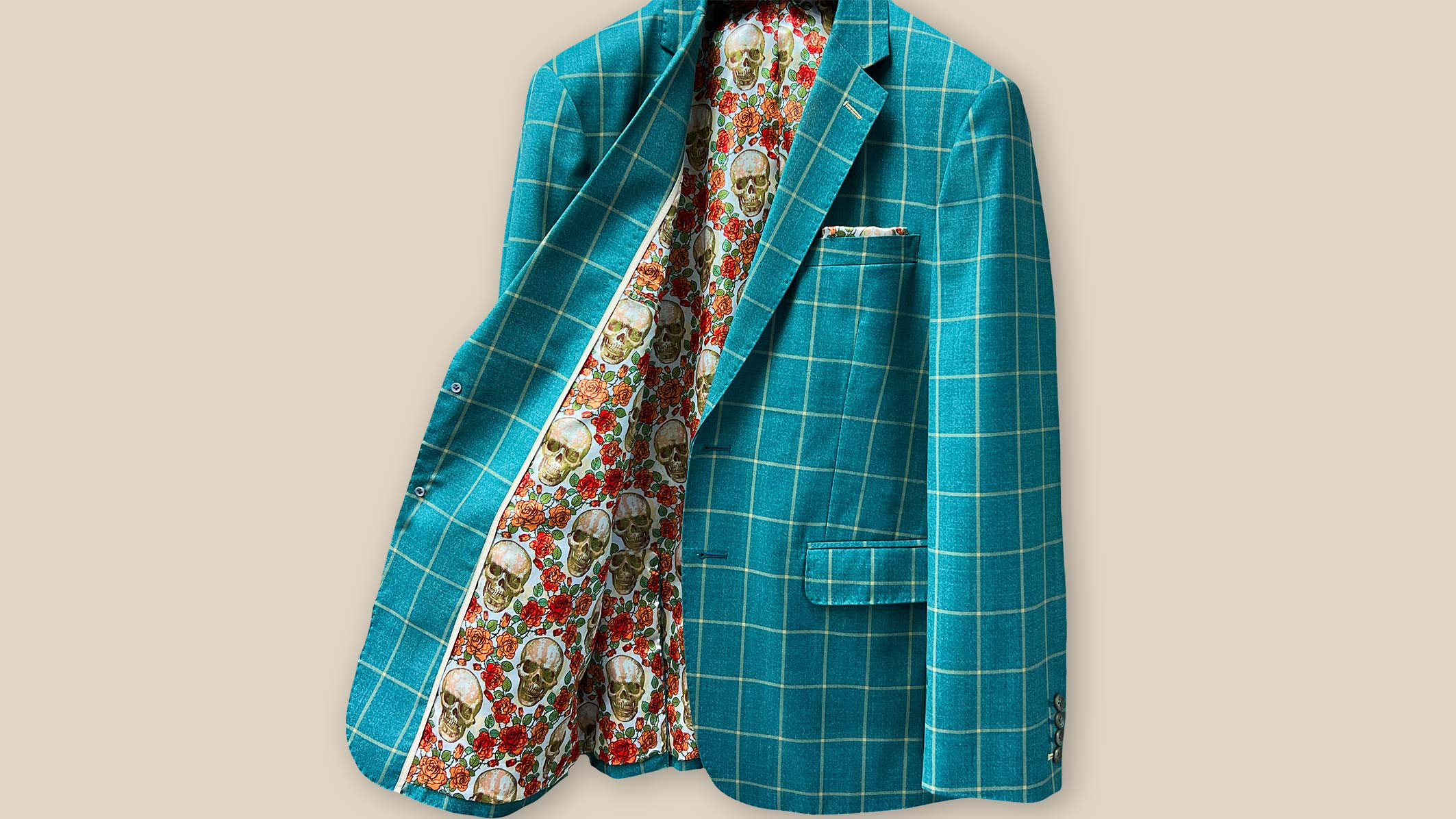 A finely tailored 100% wool green windowpane sportcoat by Westwood Hart, elegantly displayed with complementing shirts, trousers, and accessories for various semi-formal occasions.