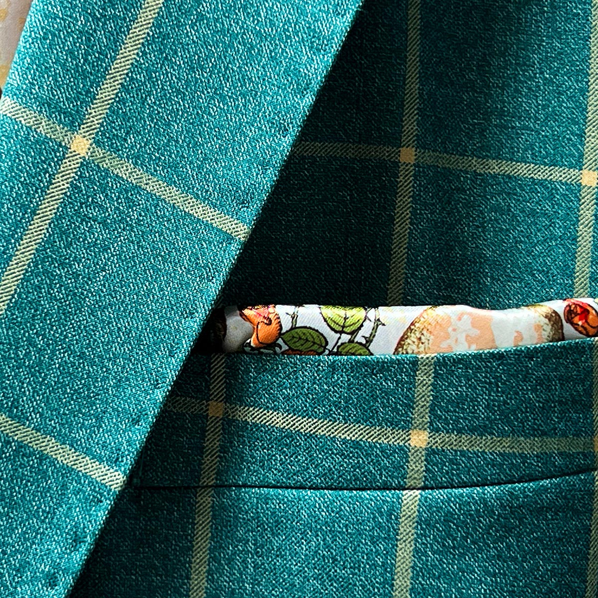 Fine fabric detail of 100% Italian wool Carribean Green Windowpane Sportcoat