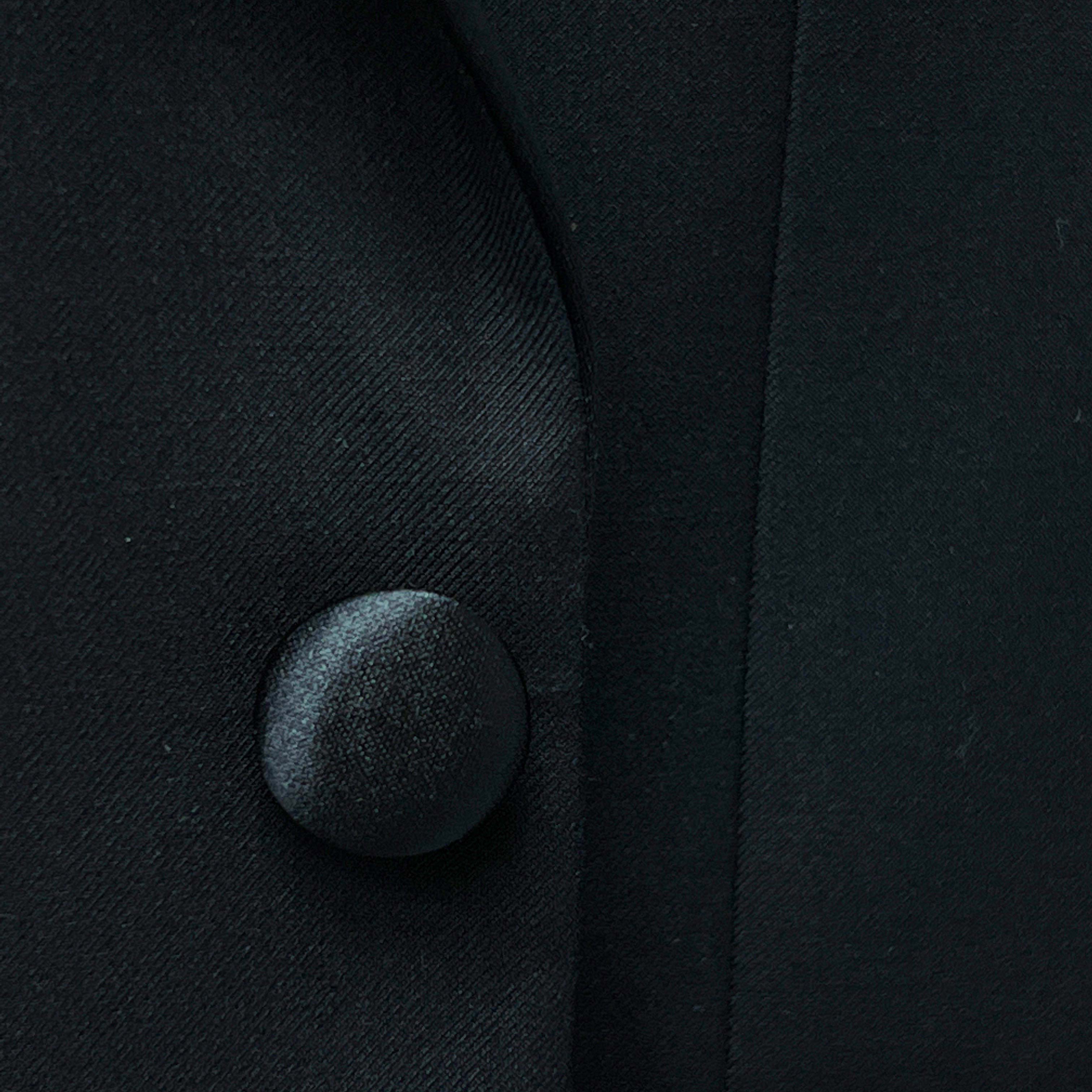Elevate your formal look with Westwood Hart's suit. This custom tailor-made, 'Black Plain Weave' fabric suit is the epitome of elegance, perfect for weddings and year-round wear.