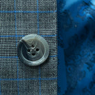 Lapel of a suit top, designed by Westwood Hart for modern men.