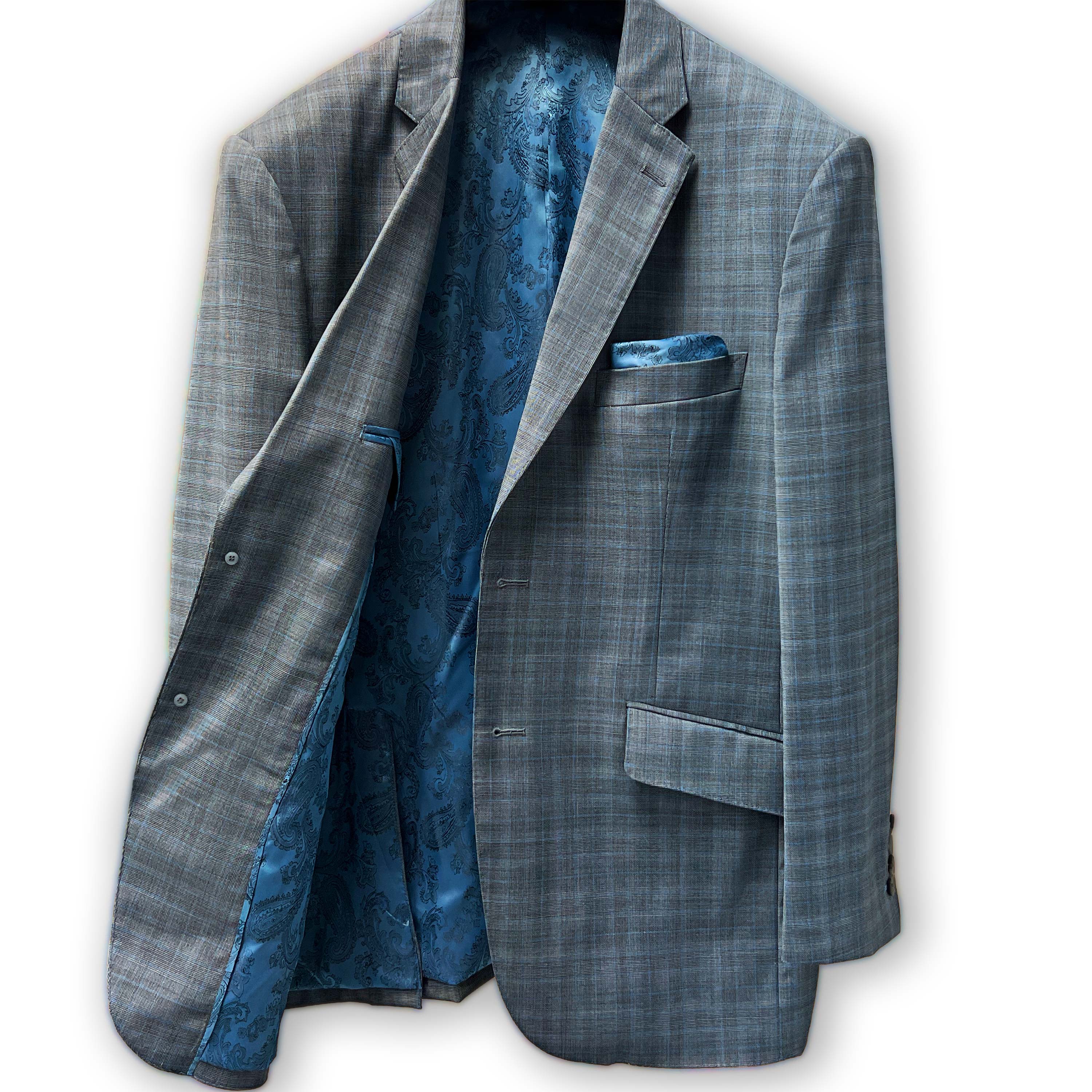 Glen check suit collar detail, epitome of craftsmanship.