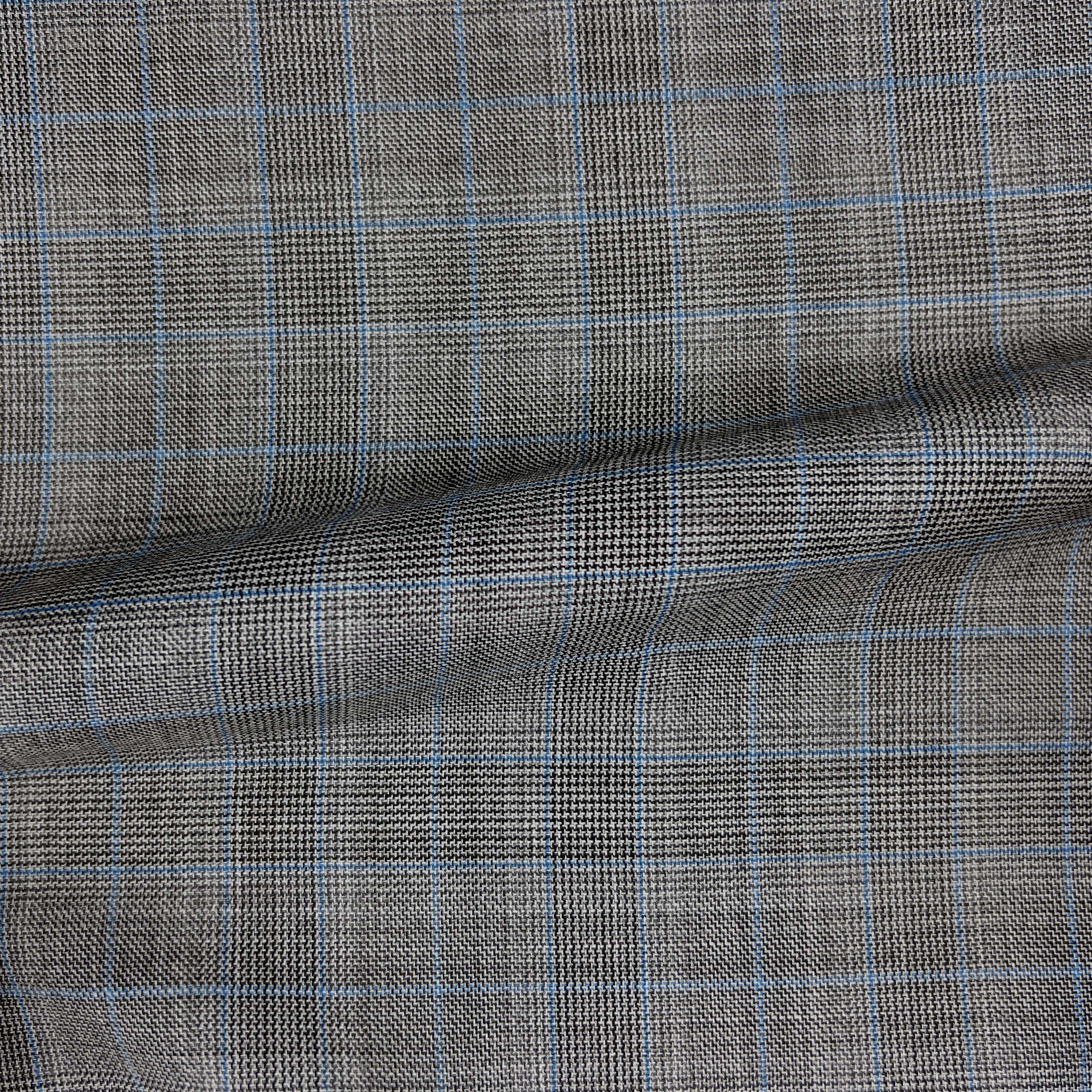 Gray with blue Prince of Wales check suit side view.
