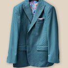 Detailed look at the hunter green houndstooth design on a men's sportcoat.