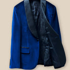 Inside jacket left view of a velvet tuxedo suit, a glimpse into the fine tailoring and attention to detail for formal wear.