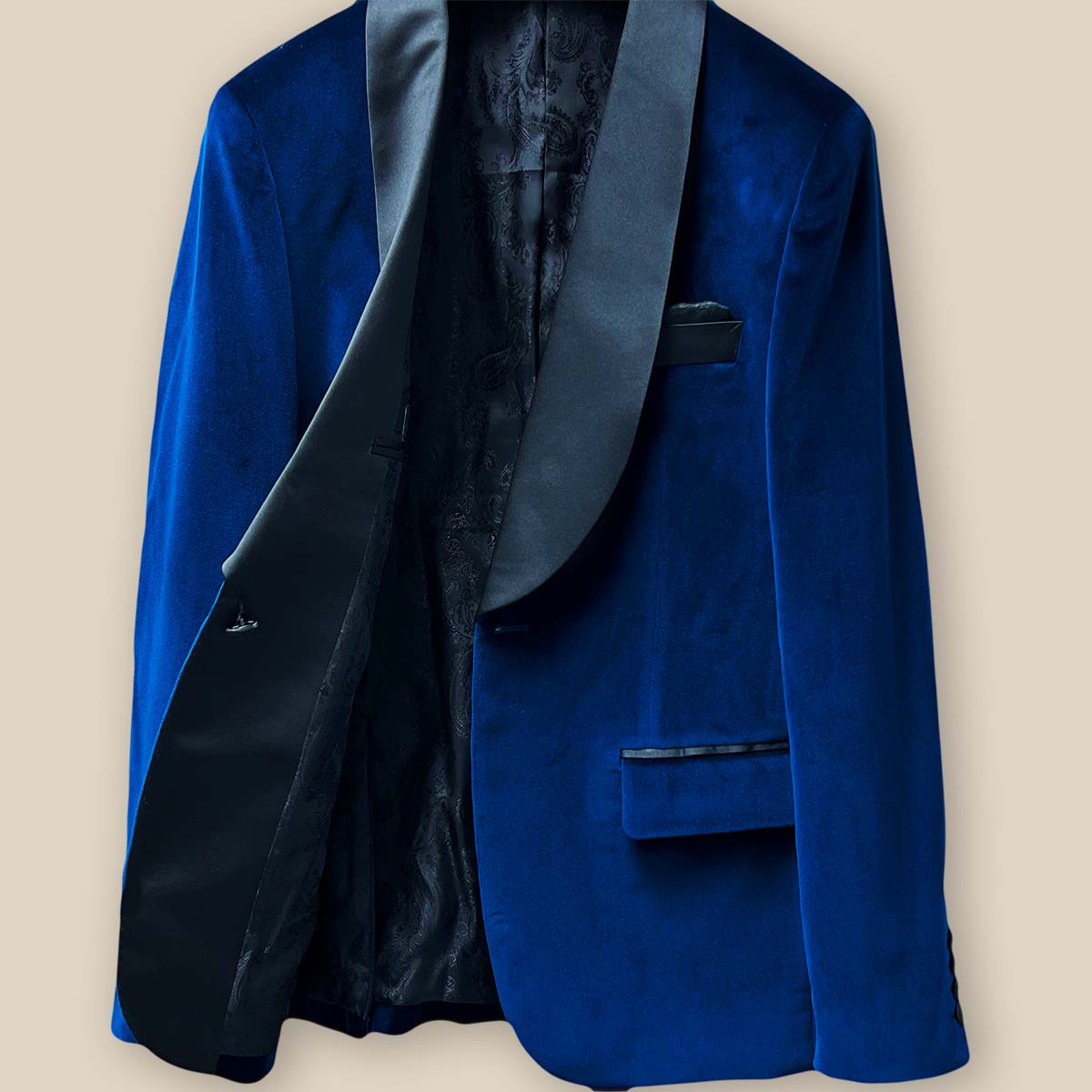 Inside jacket right view of a blue tuxedo velvet attire, showcasing meticulous tailoring for a perfect formal ensemble.