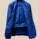 Front view of the two-piece cobalt blue sharkskin suit, displaying the notch lapel and straight flap pockets.