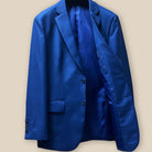 Interior view of the left side of the cobalt blue sharkskin jacket, showcasing the royal blue silk bemberg lining.