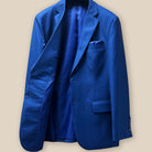 Interior view of the right side of the cobalt blue sharkskin jacket, featuring the high-quality royal blue silk bemberg lining.