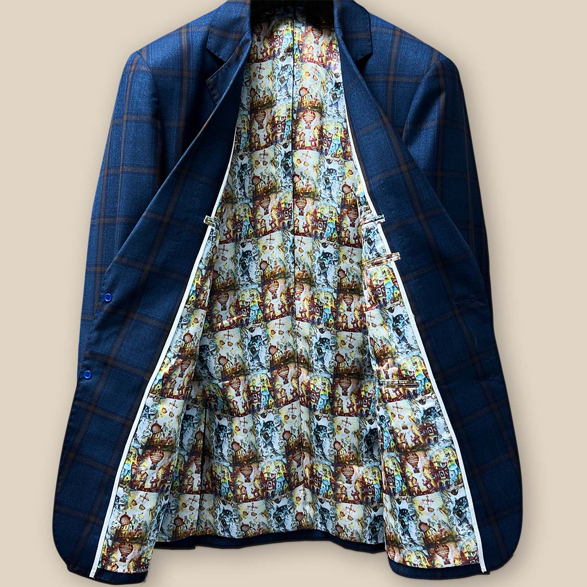 Full view of the sportcoat's interior, displaying the intricate Wizard of Oz scenes on the flash lining.