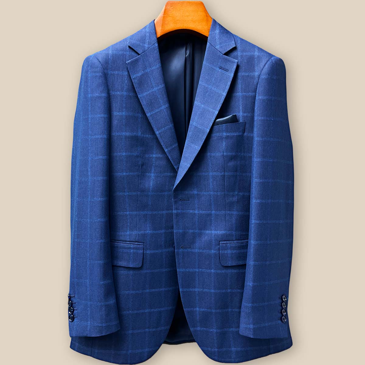 Close-up view of precise buttonhole stitching on the Indigo Blue Windowpane sport coat sleeve, showcasing fine craftsmanship and attention to detail