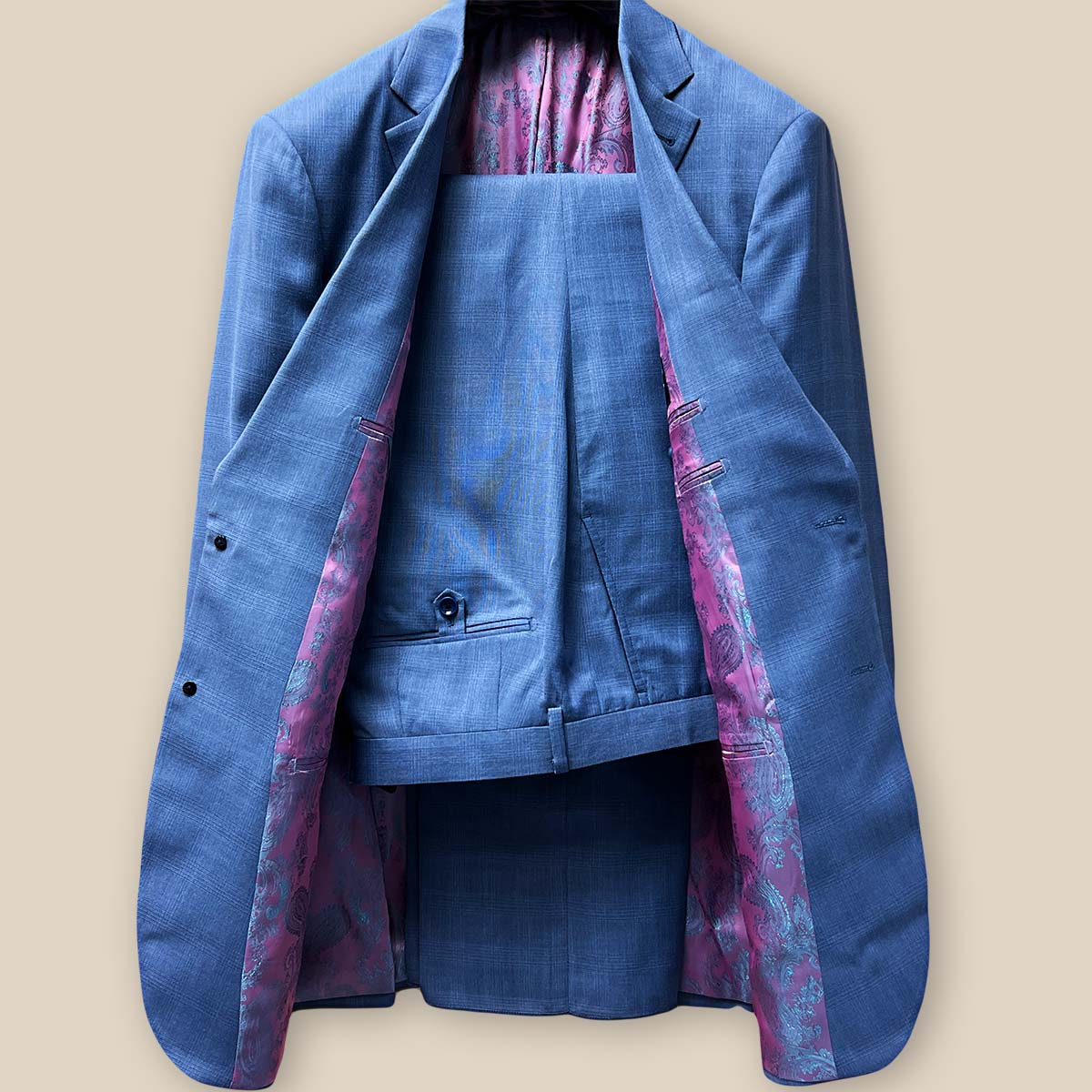 Full two-piece view of the medium blue Prince of Wales glen plaid suit, highlighting its elegant design and fit.