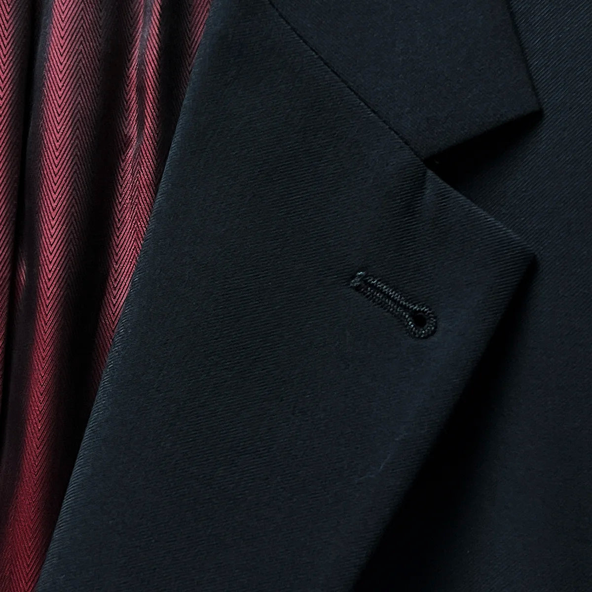 Detailed view of the notch lapel showcasing the sleek and refined design.