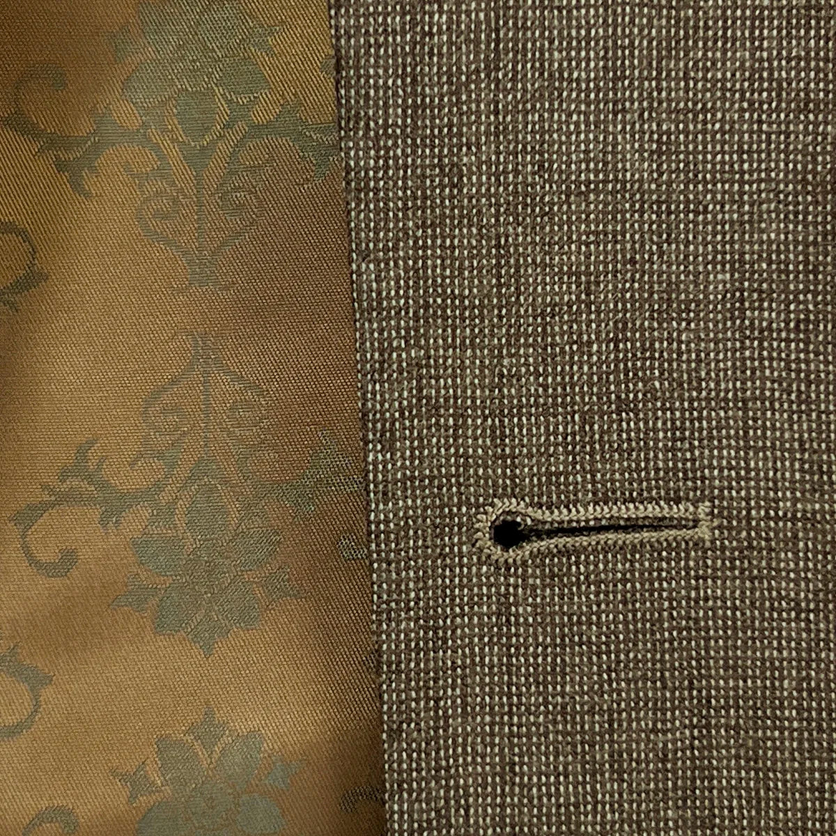 Detailed image of the buttonhole stitching on the Westwood Hart brown nailhead men's suit jacket, demonstrating the high-quality finish.