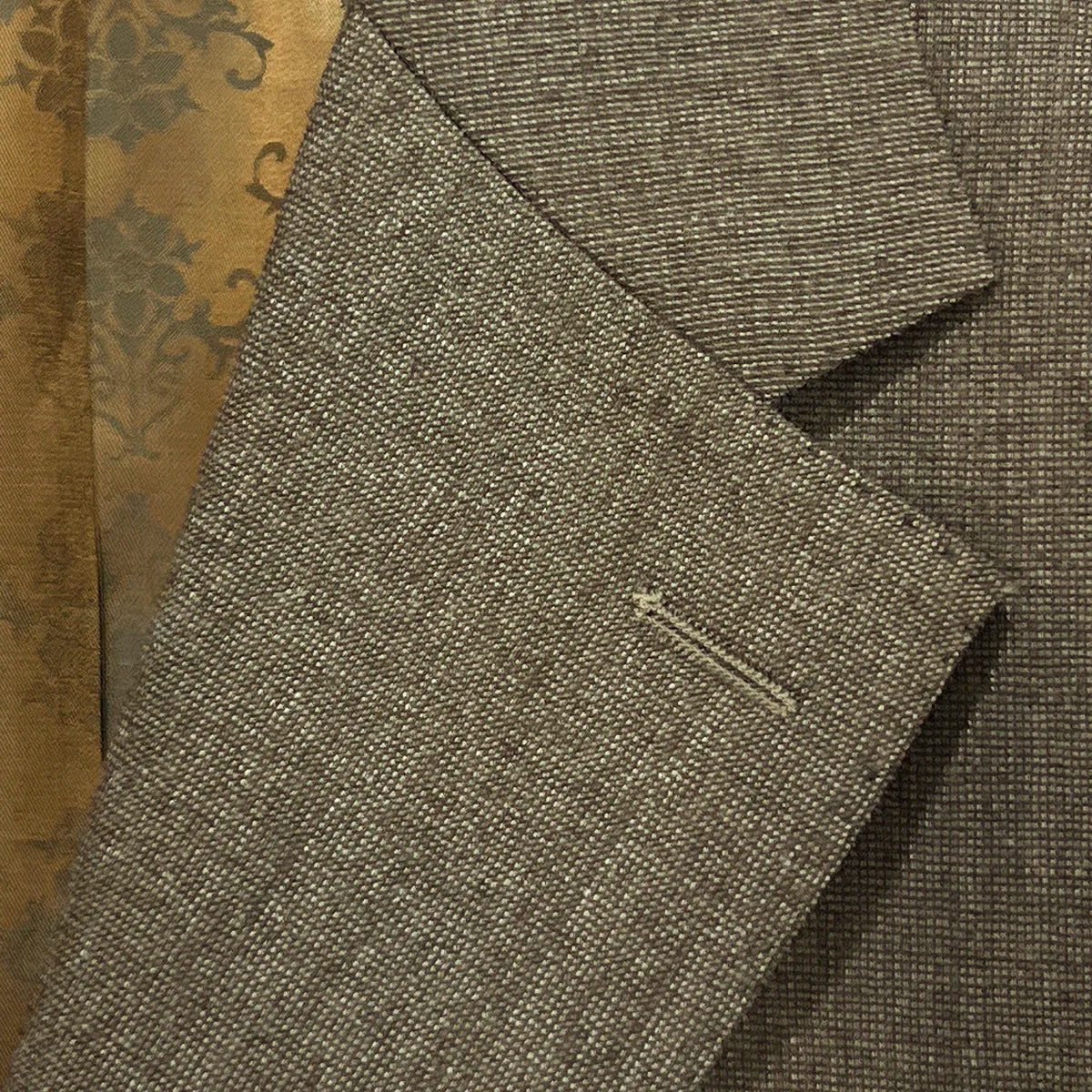 Close-up of the notch lapel on the Westwood Hart brown nailhead men's suit, showcasing the classic style.