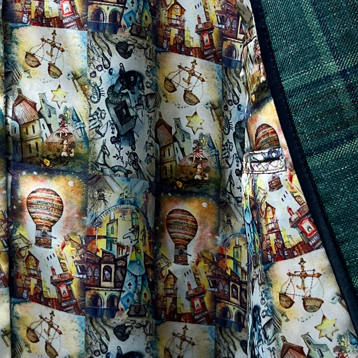 Whimsical Wizard of Oz flash linings inside the Westwood Hart hunter green with navy and chocolate brown plaid mens sport coat.